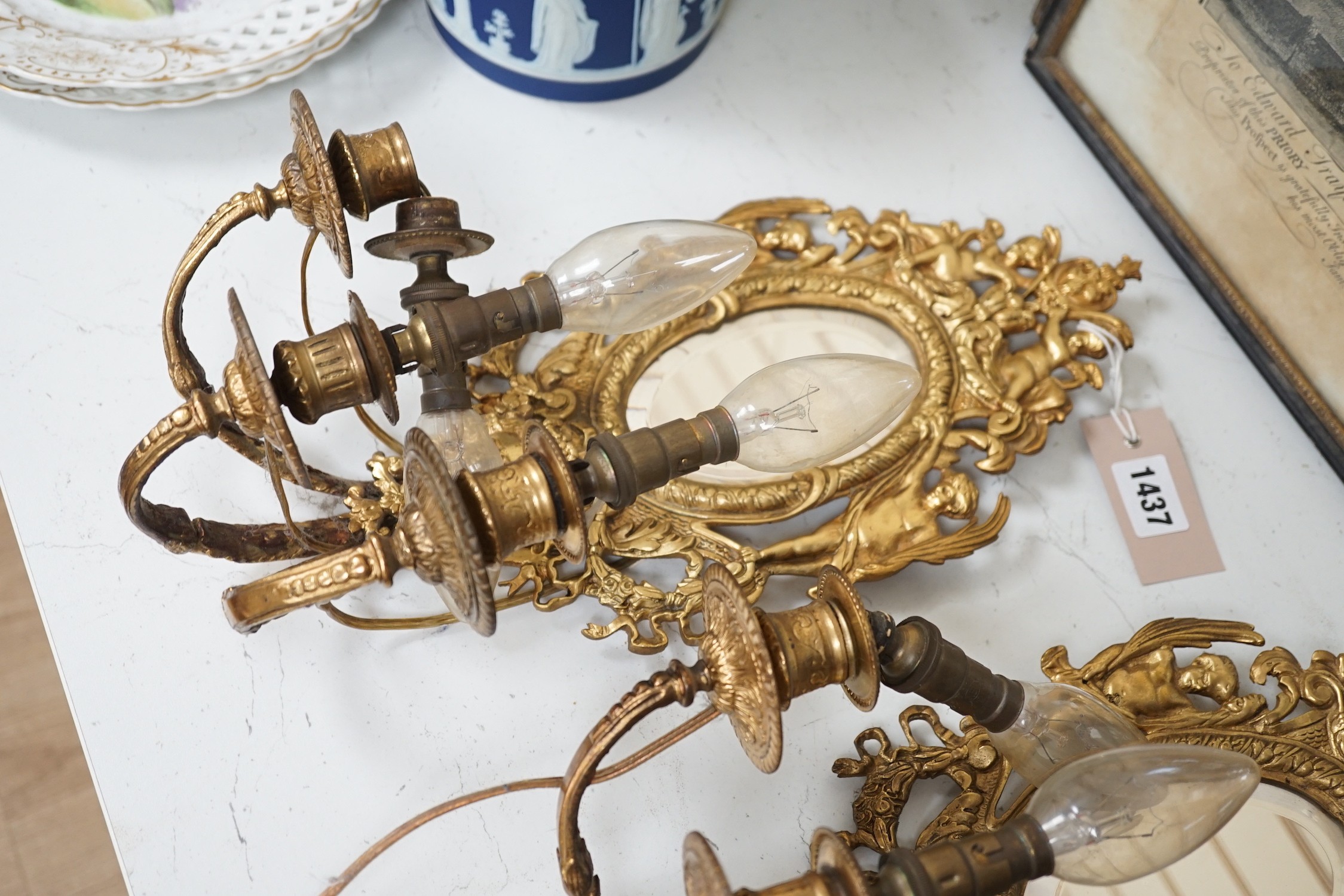 A pair of ormolu three branch girandole mirrors, c.1900, Converted to electricity, 40 cm high